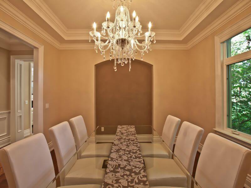 dining room with a vintage chandelier