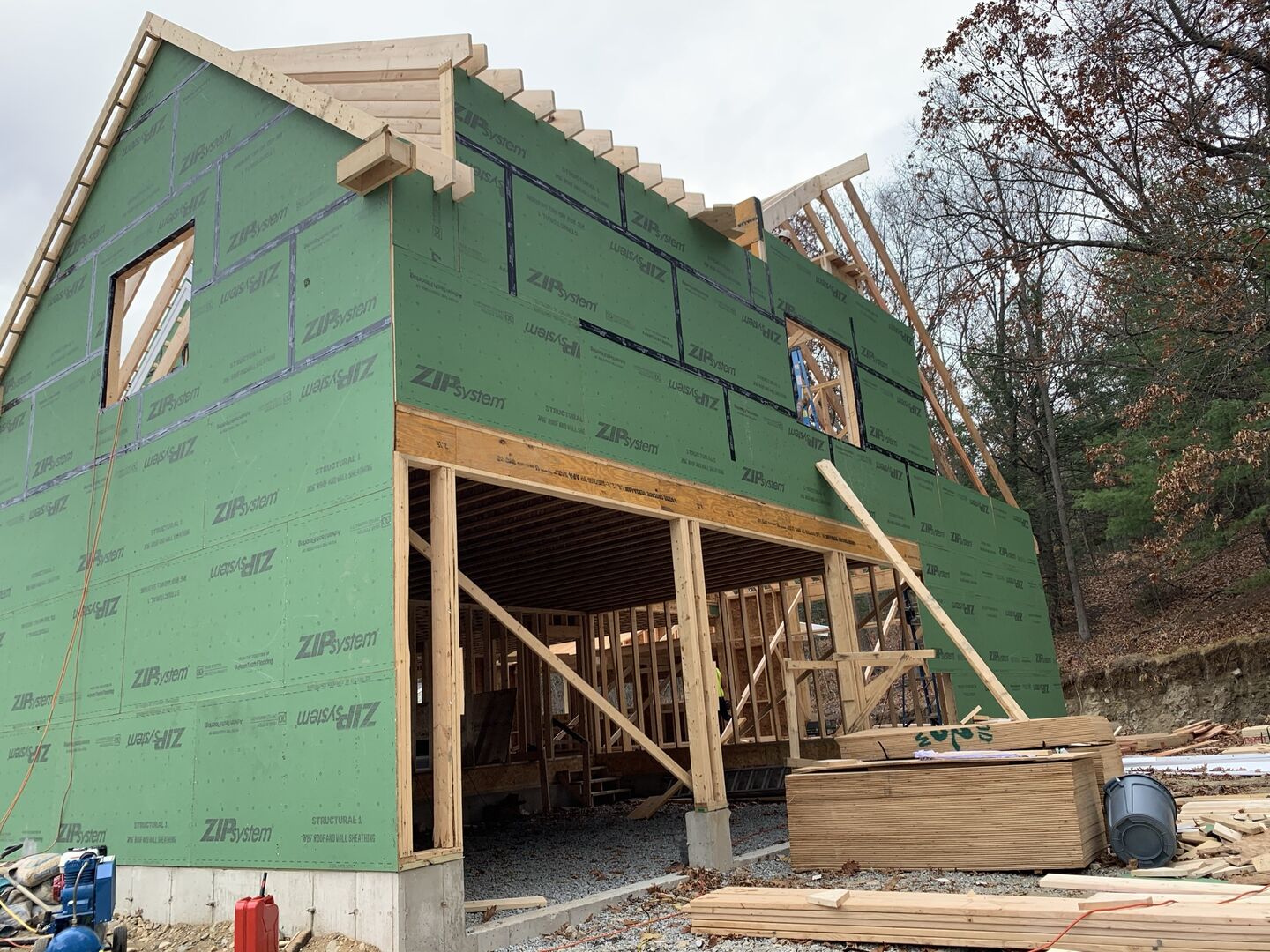 A rough framed home by a local construction company, covered in Zip System sheathing for weather protection.